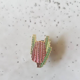 red banksia enamel pin by patch press from have you met charlie a gift shop with Australian unique handmade gifts in Adelaide South Australia