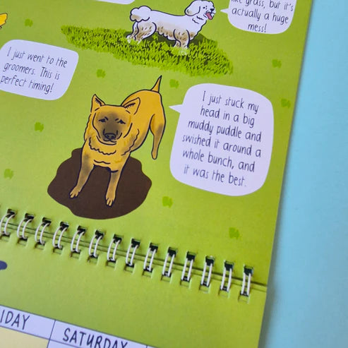 Spiral-bound notebook with a cartoon dog and text on a green background