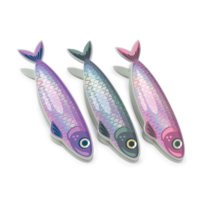 Three fish-shaped objects with colorful mermaid scale patterns on a white background