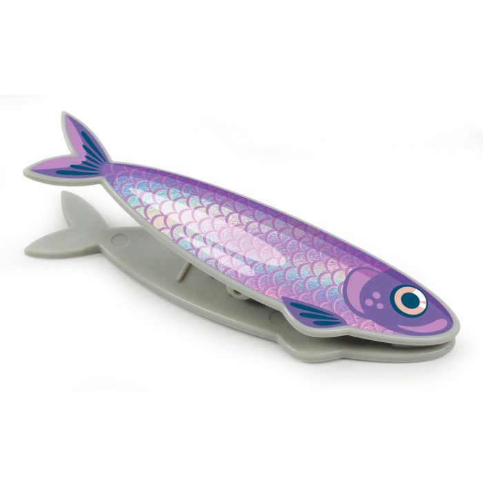 Purple fish-shaped object on a white background