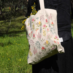 Earth Greetings Tote Bag With Pocket - Australian Wildflowers. Sold at Have You Met Charlie?, a unique gift shop located in Adelaide, South Australia.