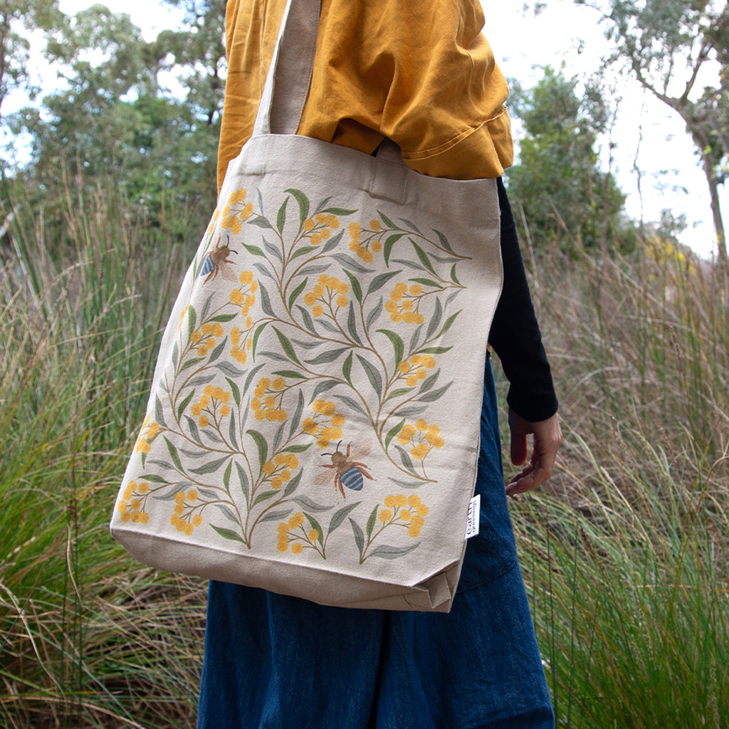 Earth Greetings Tote Bag With Pocket - Wattle & Bee, sold at Have You Met Charlie?, a unique gift shop located in Adelaide, South Australia.