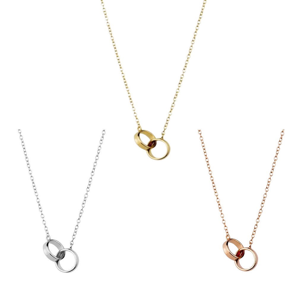 a simple sterling silver rose gold plated necklace with two entwining circle pendant have you met charlie adelaide australia unique gift shop