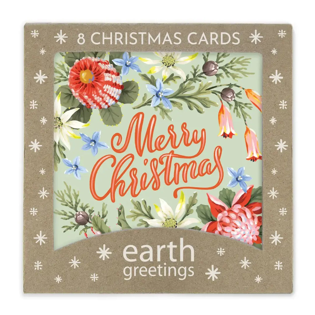 Box of 8 Christmas cards with floral design and 'Merry Christmas' text, featuring the brand 'earth greetings'.