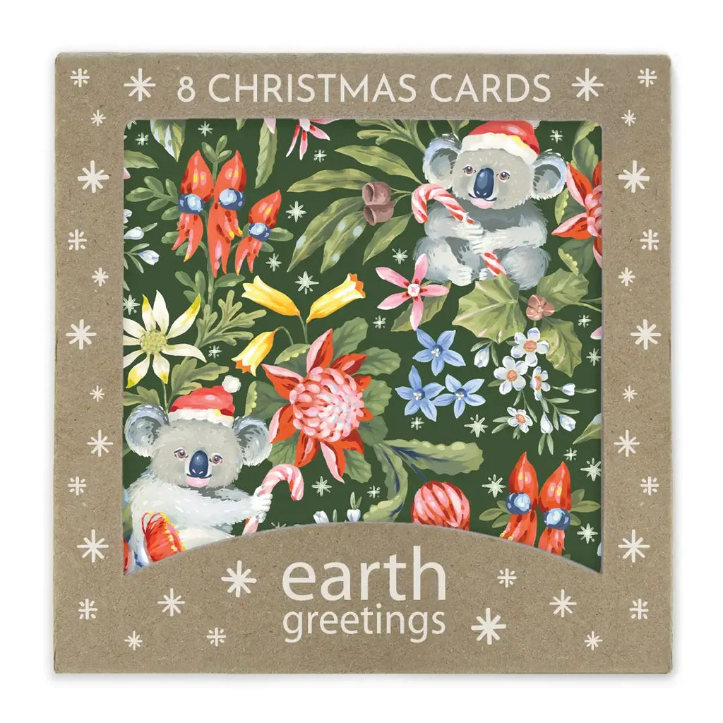 Box of 8 Christmas cards with koalas and Australian flora, featuring the brand 'earth greetings'.