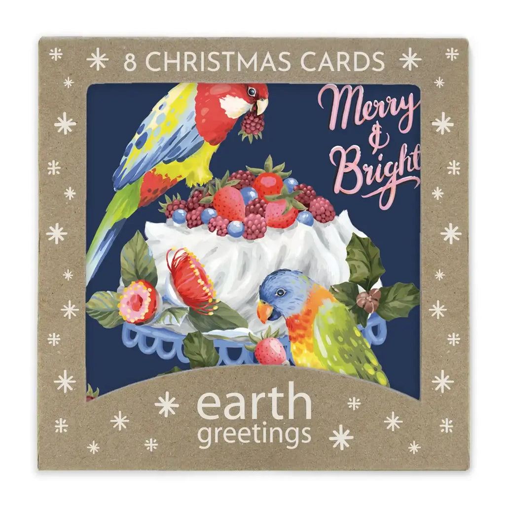 Box of Christmas cards with parrot design and 'Merry & Bright' text, featuring the brand 'earth greetings'.