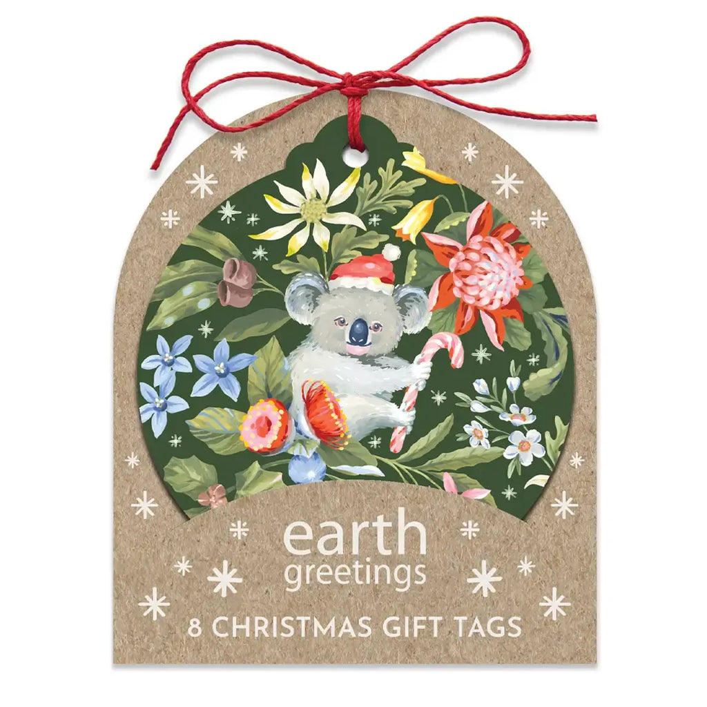 Christmas gift tag with a koala illustration and floral elements, featuring 'earth greetings' branding.