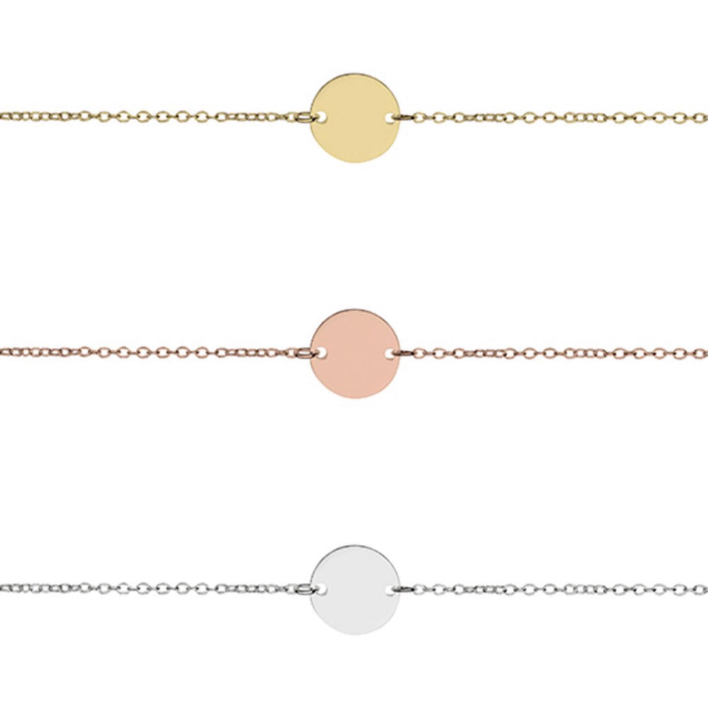 a simple fine sterling silver bracelet with disk circle charm available in silver rose gold and gold from have you met charlie? an online gift shop with unique and handmade gifts