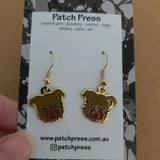 Patch press red rough coat brussels griffon puppy dog enamel dangle earrings at HYMC in Adelaide, South Australia.
