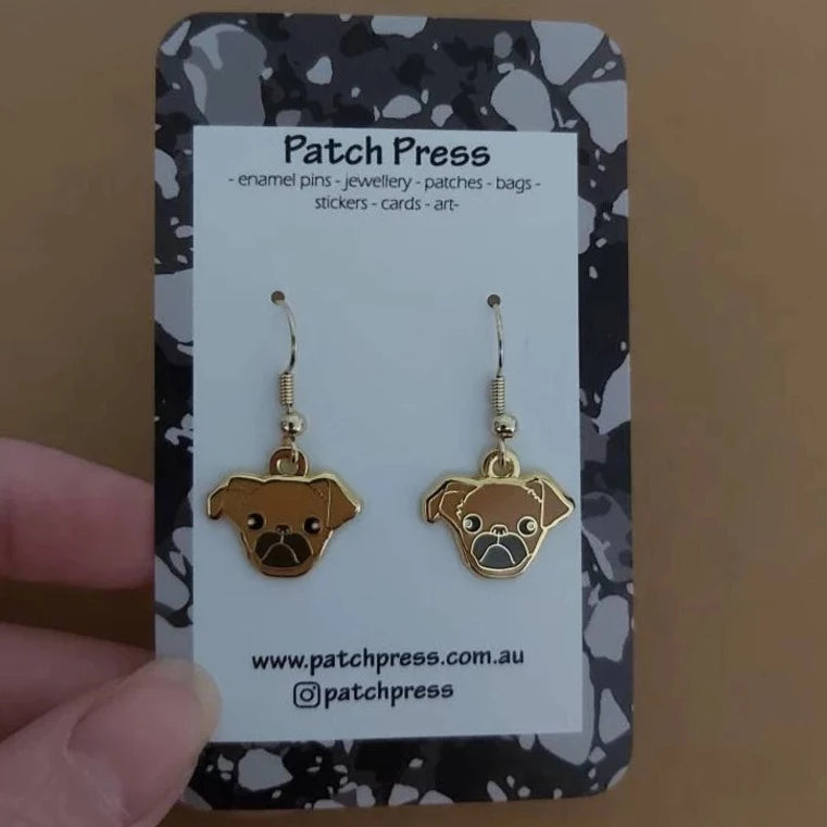 Patch press red coat brussels griffon puppy dog enamel dangle earrings at HYMC in Adelaide, South Australia.