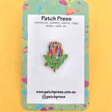 Patch Press enamel pin - rainbow protea. Sold at Have You Met Charlie?, a unique handmade gift shop in Adelaide, South Australia.